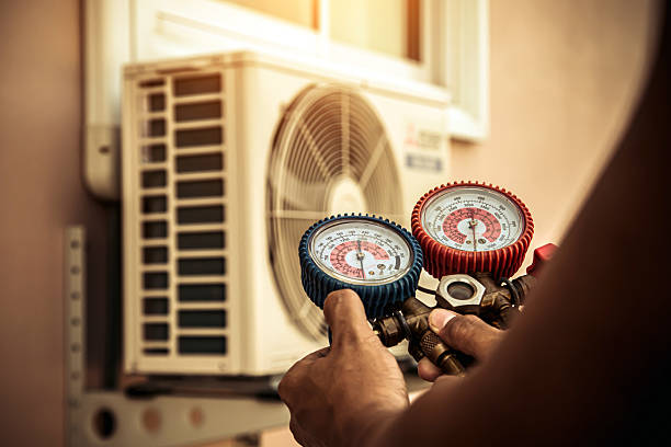 Professional Heat Pump Repair technician working in Riverside, MD